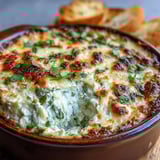 Warm Cilantro and Lime Chicken With Scoops garnished with fresh cilantro and lime wedges on a festive platter.