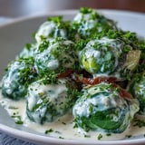 Tender Brussels sprouts in a creamy mustard sauce, served warm from a skillet and perfect alongside roasted chicken or steak for dinner.