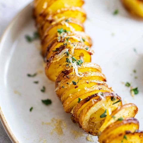 Golden, crispy Tornado Potatoes spirals, seasoned perfectly and ready to serve as a delicious snack.