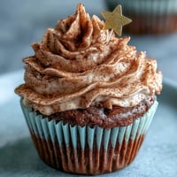 Decadent Taurus birthday cupcakes with smooth terracotta buttercream and a swirl of sweetness.